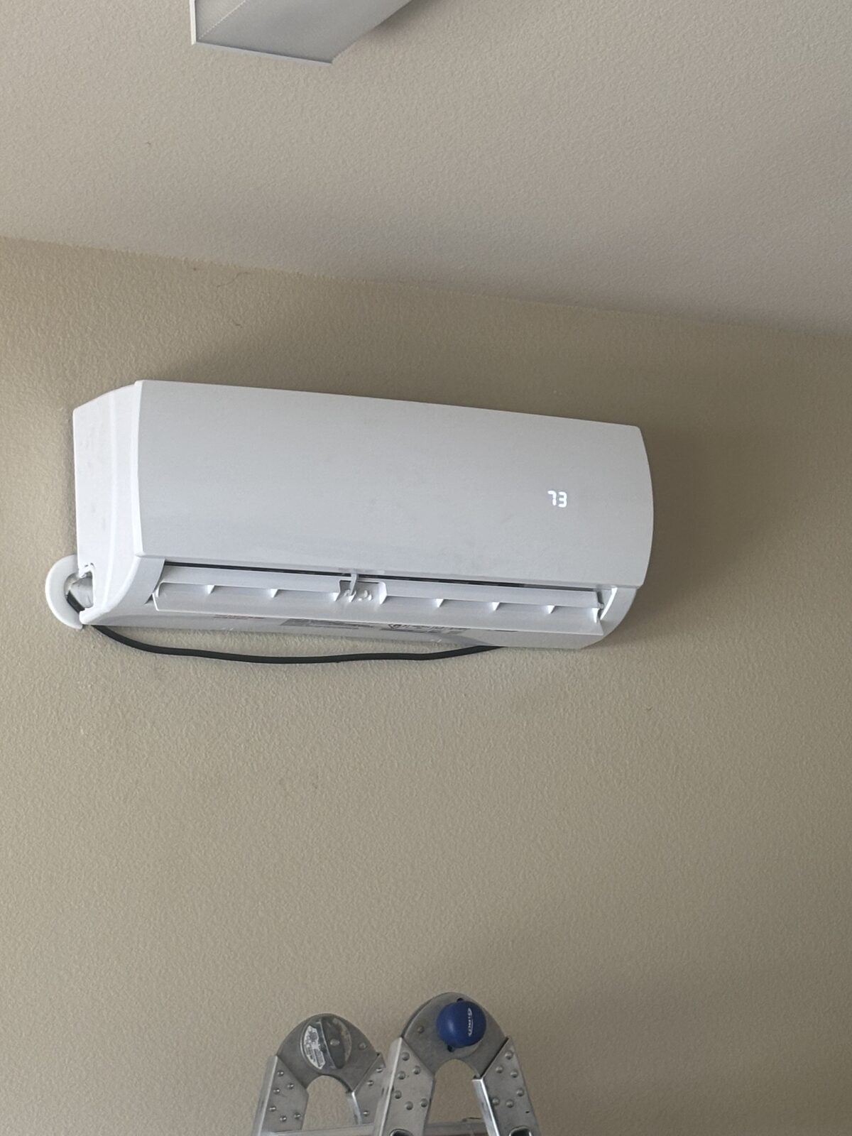 Indoor mini-split unit installed on wall